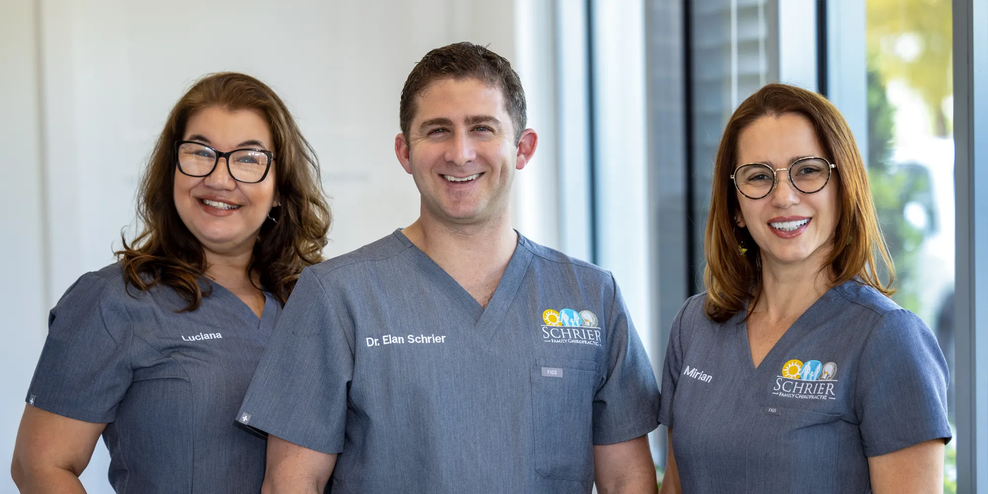 Chiropractor Delray Beach FL Elan Schrier With Team