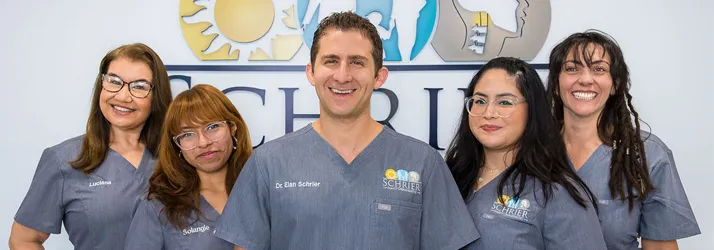 Chiropractor Delray Beach FL Elan Schrier With Team